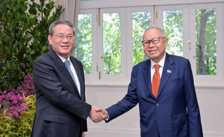 李强会见新加坡代总统张赞成